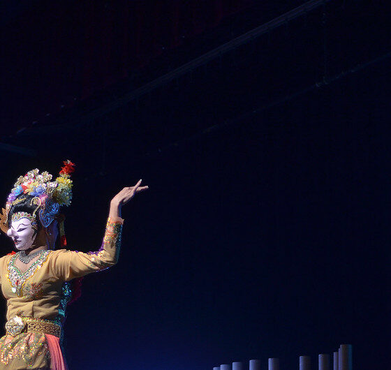 "TEDxJakarta 2011": an image of an oriental theater mask on a TEDx stage.